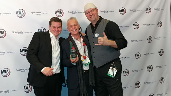 Brett Sutherlin of FusionZONE websites joins Jeff Sterns and Tom LaPointe to celebrate the third consecutive CarChat24 AWA Award at NADA in New Orleans